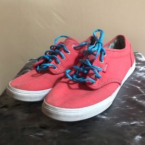 Salmon pink Vans with blue laces